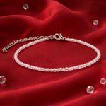 Rudvya Clear Quartz Anklet on red fabric with silver adjustable clasp