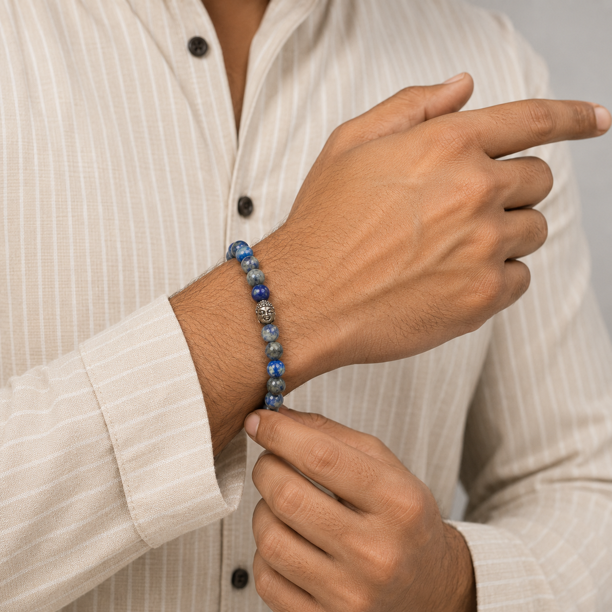 Lapis Lazuli Buddha Bracelet worn on wrist lifestyle product photo