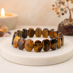 Rudvya Tiger Eye Flat-Beaded Bracelet with oval flat natural tiger eye stones on premium display